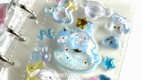 サンリオのボンボンドロップシール。シナモロールのぷっくり立体シールをアルバムに貼った様子